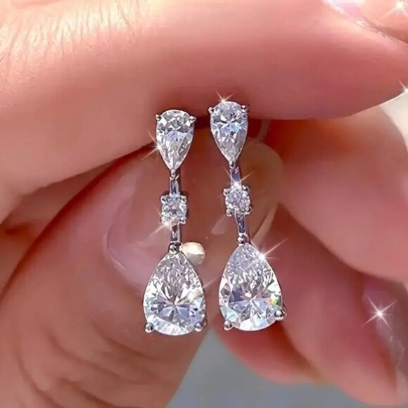 Elegant Silver Drop Earrings‎ With Tear-Shaped Cubic Zirconia & Round Ac… - Picture 2 of 3